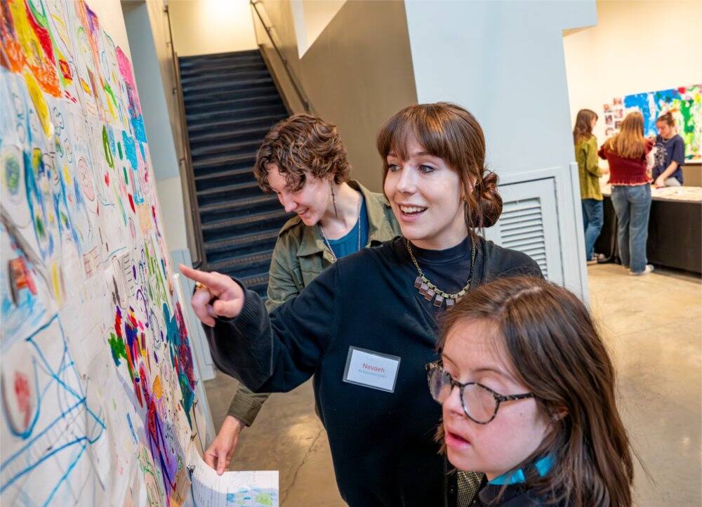 Lakers work with special education students to create playful art pieces
